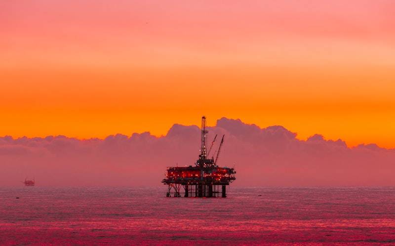 Offshore oil rig in the Gulf of Mexico at sunset